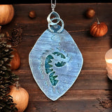 Indonesian Plume Agate and carved Moonstone sterling silver pendant.  $75