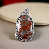 Red Plume Opal Wood Sterling Silver Pendant     $80