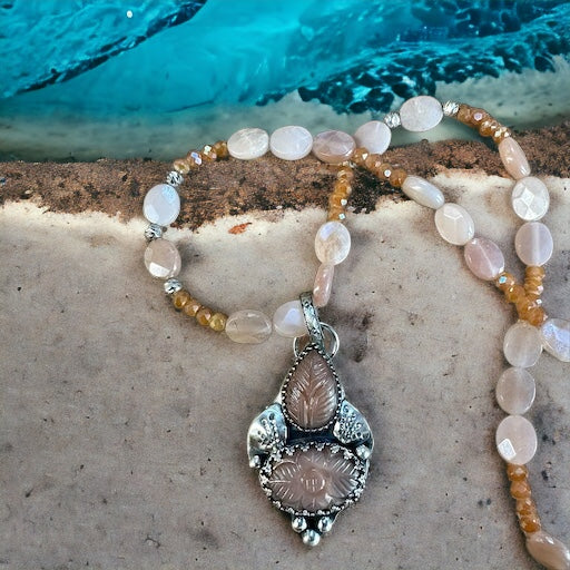 Peach Moonstone Pendant and matching necklace set.    $75