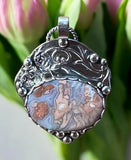 Youngite Sterling Silver Floral Pendant.  $75