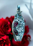 Carved Garnet Sterling Silver Rose Pendant.   $75
