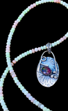 Ethiopian Opal sterling silver pendant and matching necklace.    $65