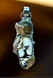 Peanut Wood and Moonstone Leaf Pendant.     $65