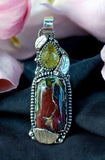 Indonesian Opalized Petrified Wood Sterling Silver pendant.    $75