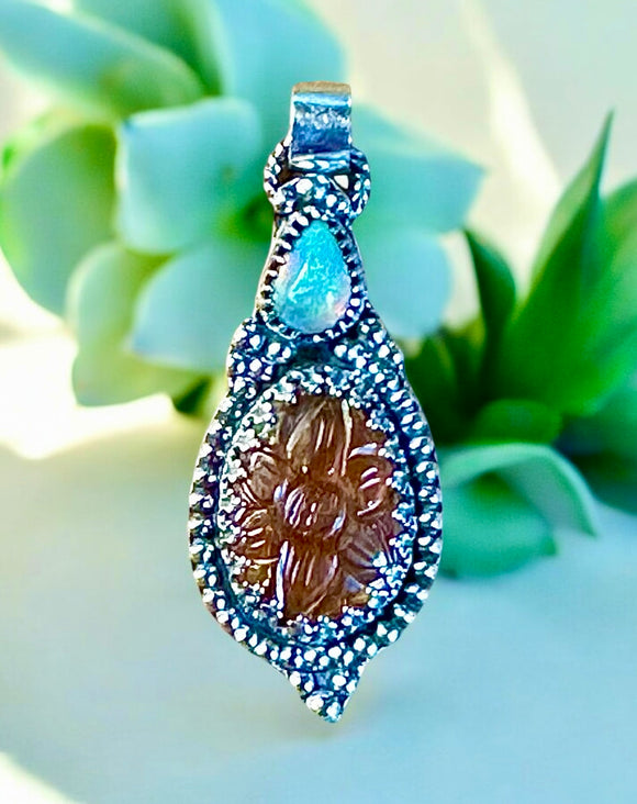 Carved Kyanite and Ethiopian Opal Sterling Silver Pendant.  $65