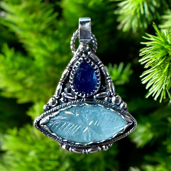 Carved Aquamarine and Sapphire Sterling Silver Pendant.   $65