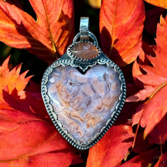 Youngite Heart and Sunstone Sterling Silver Pendant.    $75