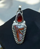 Crazy Lace Agate and Garnet sterling silver pendant.      $60