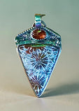 Fossilized Coral and Garnet sterling silver pendant.    $75