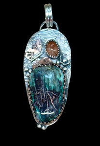 Copper in Chalcedony Sterling Silver Pendant. $75
