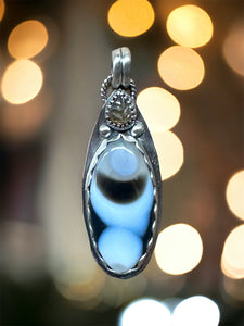 Agate and Tourmaline Sterling Silver Pendant.    $60