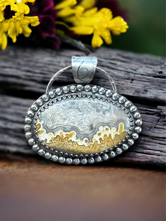 Crazy Lace Agate sterling silver pendant.    $70