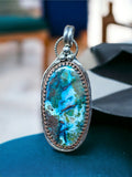 Chrysocolla and Copper in Chalcedony Sterling Silvet Pendant.    $75