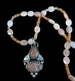 Peach Moonstone Pendant and matching necklace set.    $75