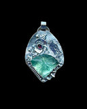 Carved  Fluorite bird sterling silver pendant.  $70