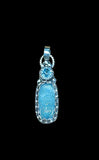 Carved Aquamarine and Topaz Sterling Silver Pendant.   $60