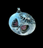 Carved Tourmaline Butterfly Floral Sterling Silver Pendant.    $75