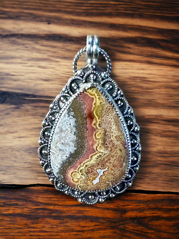 Crazy Lace Agate Sterling Silver Pendant.    $75