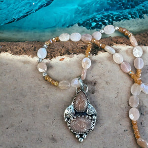 Peach Moonstone Pendant and matching necklace set.    $75