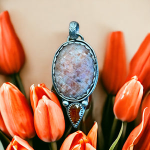 Carved Sunstone and Kyanite Sterling Silver Pendant.   $60