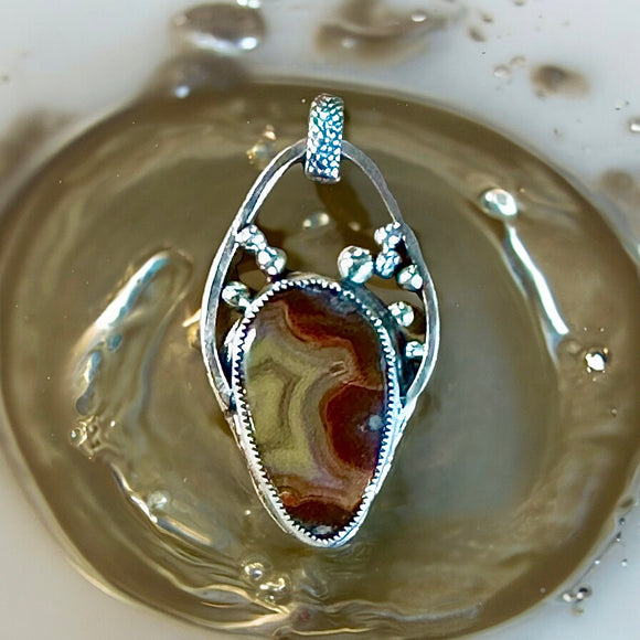 Condor Agate Sterling Silver Pendant.   $65