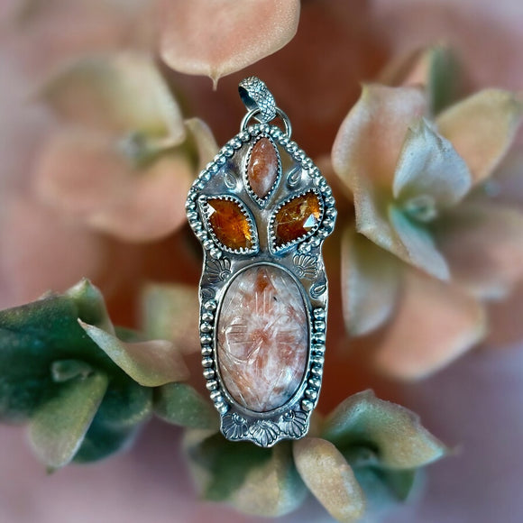 Carved Sunstone and Kyanite Large Sterling Silver Pendant.       $75