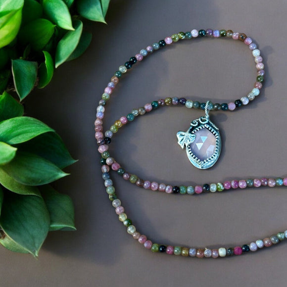 Pink Chalcedony sterling silver pendant and tourmaline gemstone necklace set.    $60