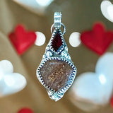 Sunstone and Garnet Sterling Silver Pendant.   $55