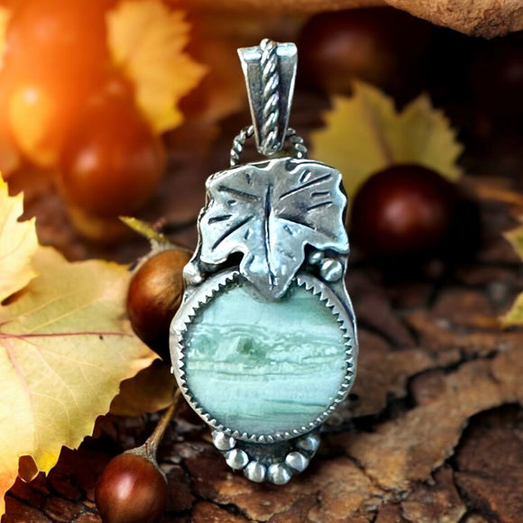 Green Jasper Sterling Silvet small Pendant.  $50