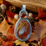 Noreen and Garnet Sterling Silver Pendant.    $50