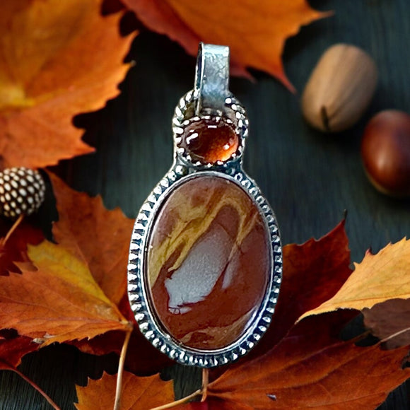 Noreen and Garnet Sterling Silver Pendant.    $50