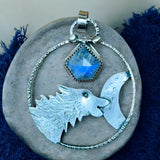 Rainbow Moonstone Wolf Moon Sterling Silver Pendant.    $65