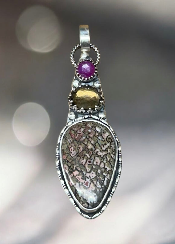 Pink Dinosaur Bone sterling silver pendant. Smoky Quartz and Pink Sapphire Sterling Silver Pendant.    $75