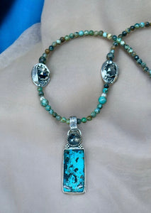 Shattuckite, Rutilated Quartz Sterling Silver pendant and Turquoise Beaded Necklace Set.      $95