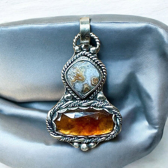 Crazy Lace Agate and Hessonite Garnet Sterling silver pendant.  $65