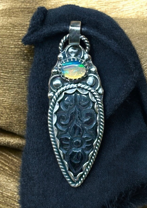 Carved Silver Sheen Obsidian and Opal Sterling Silver Pendant.   $70