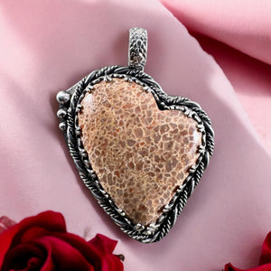 Dinosaur Bone Heart Sterling silver pendant.  $80