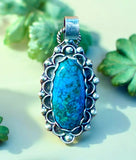 Chrysocolla Malachite and spiderweb Cuprite sterling silver silver pendant.   $70