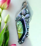 Serpentine , obsidian and rhodonite Intarsia sterling silver pendant.     $85