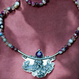 Sapphire sterling silver floral pendant and matching tourmaline gemstone necklace.      $90