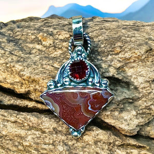 Crazy Lace Agate and Garnet sterling silver pendant.      $70