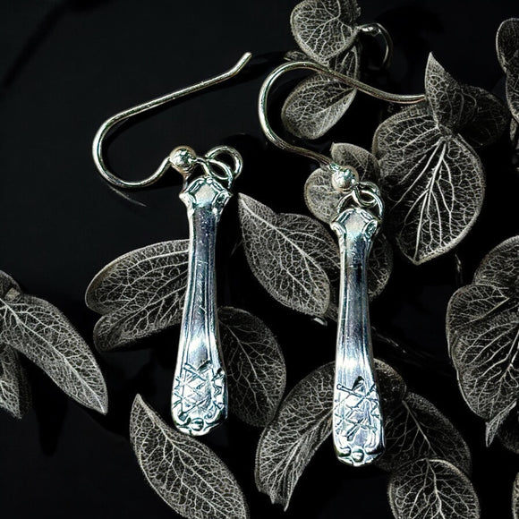 Sterling Silver Dangle Earrings.      $45
