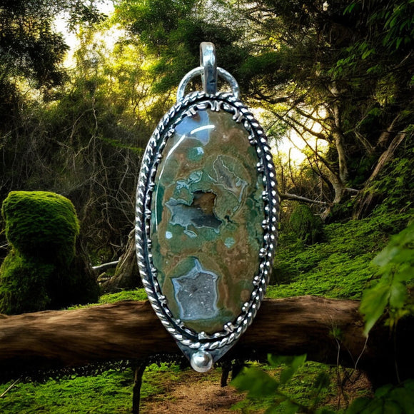 Rainforest Rhyolite Sterling Silver Pendant.    $75