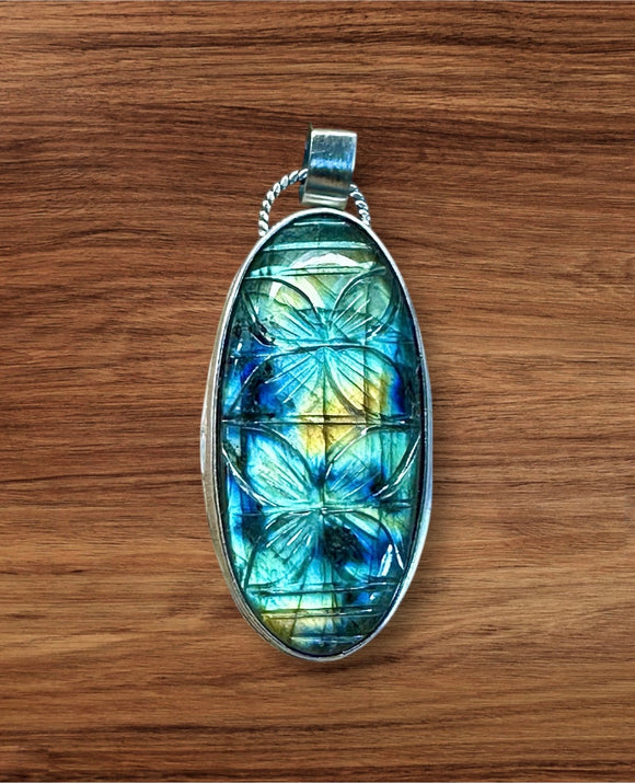 Carved Labradorite Sterling Silver Pendant.   $75