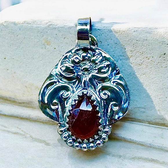 Garnet Floral Sterling Silver Pendant     $65
