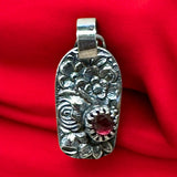 Ruby Floral Sterling Silver Pendant.  $70