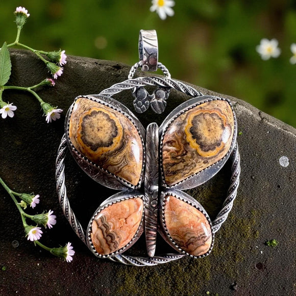 Flowering Tube Onyx Butterfly Sterling Silver Pendant.  $140