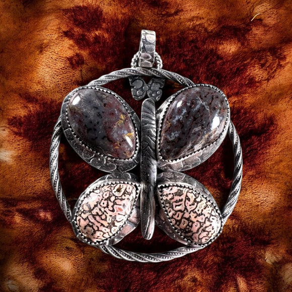 Fossilized Dinosaur Bone Sterling Silver Butterfly.  $95