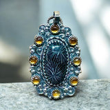Black Star Coral and Citrine sterling silver pendant.   $90
