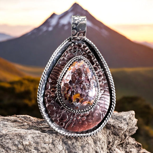 Copper in Chalcedony Sterling silver pendant.  $75